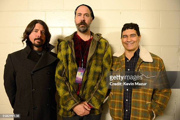 Dave Grohl and Krist Novoselic at the 12-12-12 The Concert For Sandy Relief at Madison Square Garden on December 11, 2012 in New York City.