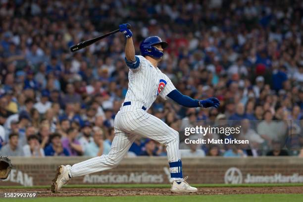 Jared Young of the Chicago Cubs watches the flight of the ball in a game against the Philadelphia Phillies at Wrigley Field on June 29, 2023 in...