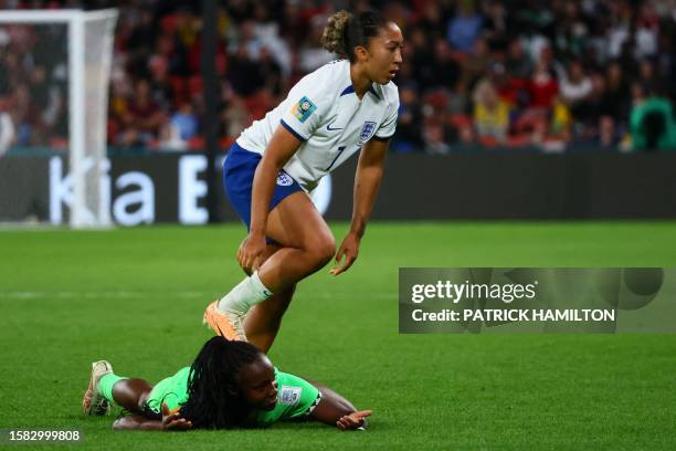 Nigeria's defender Michelle Alozie reacts after being fouled by England's forward Lauren James during the Australia and New Zealand 2023 Women's...