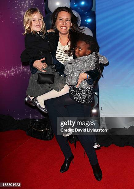 Actress Joely Fisher and daughters True Harlow Fisher-Duddy and Olivia Luna Fisher-Duddy attend the opening night of Disney On Ice's "Dare To Dream"...