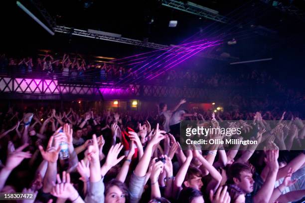 The crowd watch on as Enter Shikari Perform onstage during a day of the 5th UK leg of their A Flash Flood of Colour World Tour called A Flash Flood...