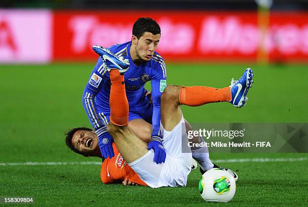 Eden Hazard of Chelsea tangles with Sergio Perez of CF Monterrey during the FIFA Club World Cup Semi Final match between CF Monterrey and Chelsea at...