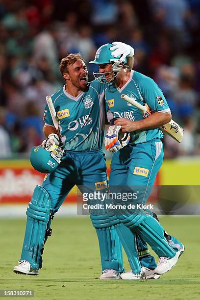 Chris Hartley and Peter Forrest of the Heat celebrates after the Big Bash League match between the Adelaide Strikers and the Brisbane Heat at...