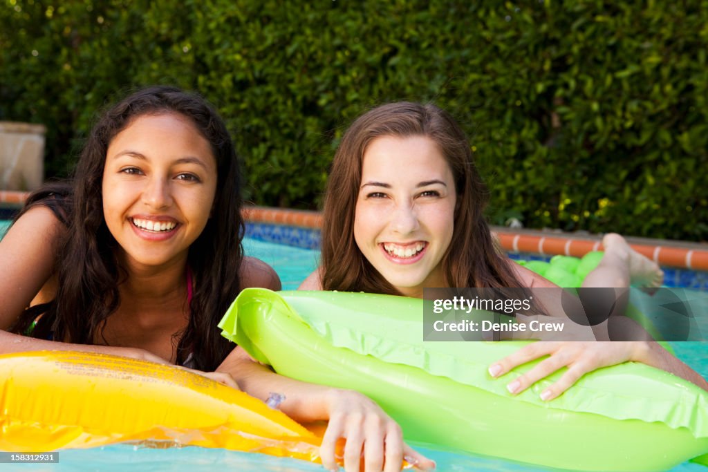 Woman In Inflatable Raft Girls In Inflatable Raft In Swimming Pool High-Res Stock Photo - Getty ...