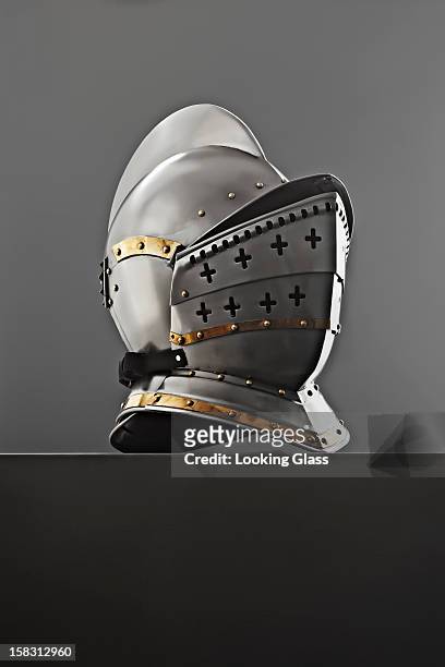 old-fashioned knight's helmet - traditioneller helm stock-fotos und bilder