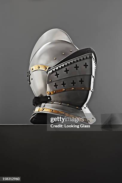 old-fashioned knight's helmet - capacete tradicional imagens e fotografias de stock