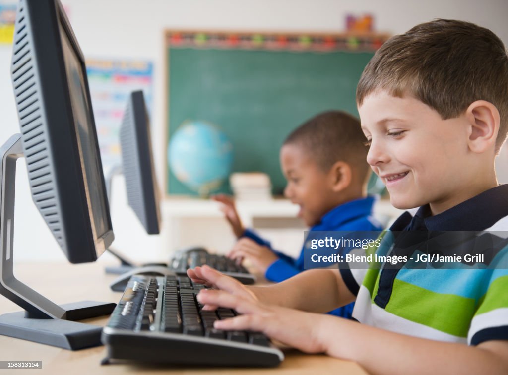 Student Using Computer Procedure Students Using Computers In Classroom High-Res Stock Photo - Getty Images