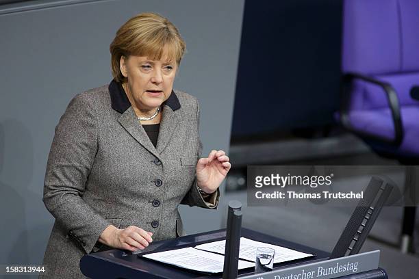 German Chancellor Angela Merkel gives a government declaration at Reichstag, the seat of the German Parliament on December 13, 2012 in Berlin,...