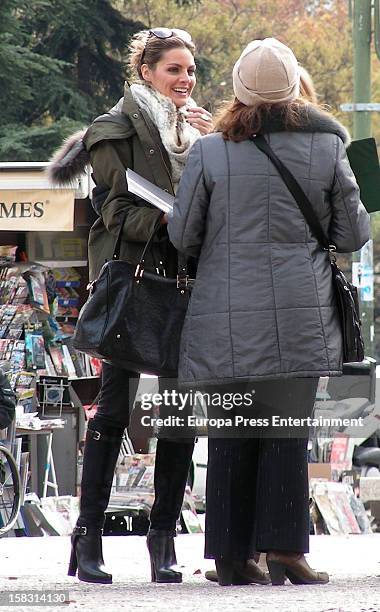 Spanish actress Amaia Salamanca is seen during a photo session for a photographer who is trying to reach a Guiness Record shooting people kissing to...