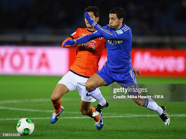 Eden Hazard of Chelsea tangles with Sergio Perez of CF Monterrey during the FIFA Club World Cup Semi Final match between CF Monterrey and Chelsea at...