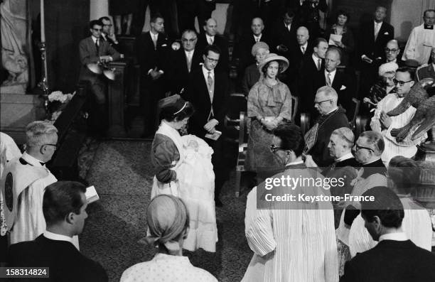 Christening Of young Princess Astrid daughter of Prince Albert of Liege and Princess Paola by Archbishop of Brussels Mechelen Cardinal Suenens in...