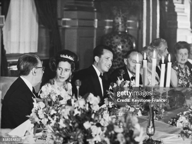 King Baudouin I Of Belgium and wife Queen Fabiola Of Belgium at the gala dinner in the Royal Palace of Brussels for NATO, in Belgium.