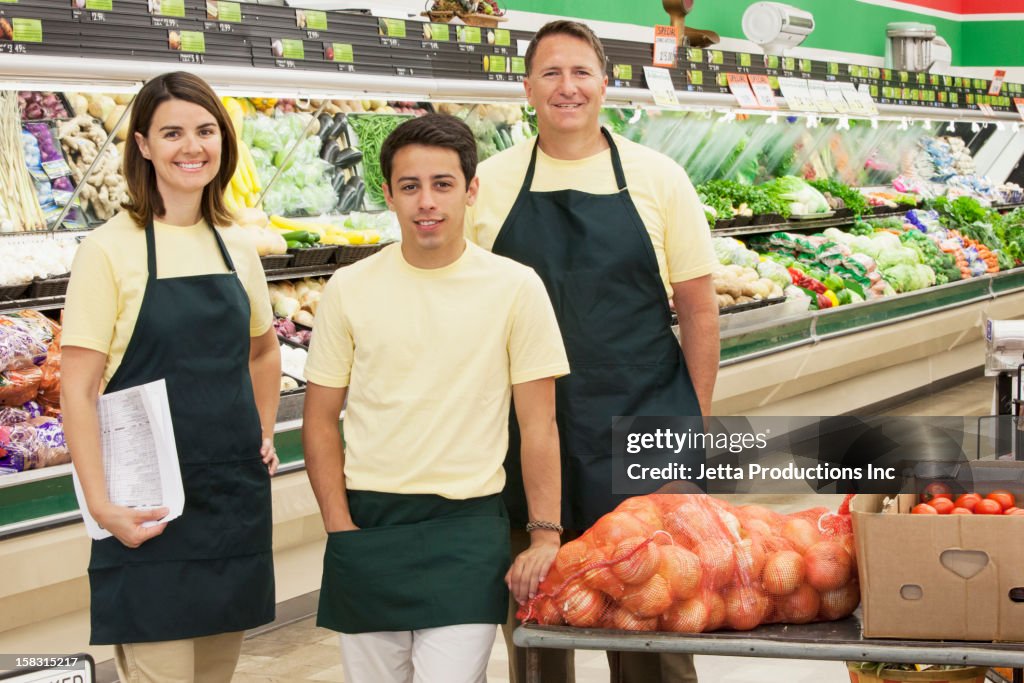 Grocer Workers In Produce Section Of Grocery Store High-Res Stock Photo ...