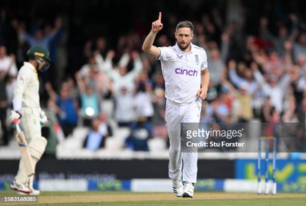 Chris Woakes of England celebrates the wicket of Mitchell Starc of Australia during Day Five of the LV= Insurance Ashes 5th Test Match between...