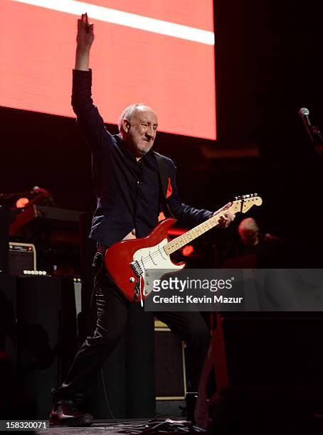 Pete Townshend of The Who performs at "12-12-12" a concert benefiting The Robin Hood Relief Fund to aid the victims of Hurricane Sandy presented by...