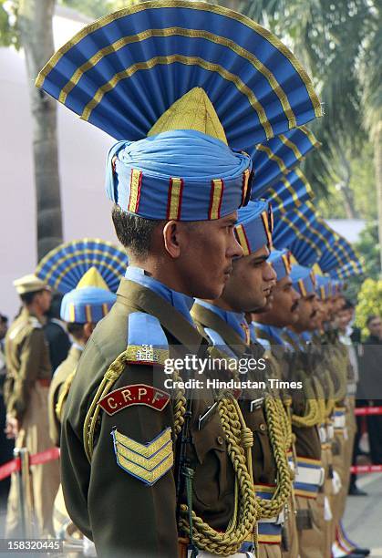 Central Reserve Police Force personnel pay homage to martyrs during a remembrance ceremony of the 2001 Parliament attack, at Parliament House on...