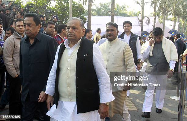 Mulayam Singh Yadav chief of Samajwadi Party and Parliamentary Affairs Minister Kamal after pays homage to martyrs during a remembrance ceremony of...