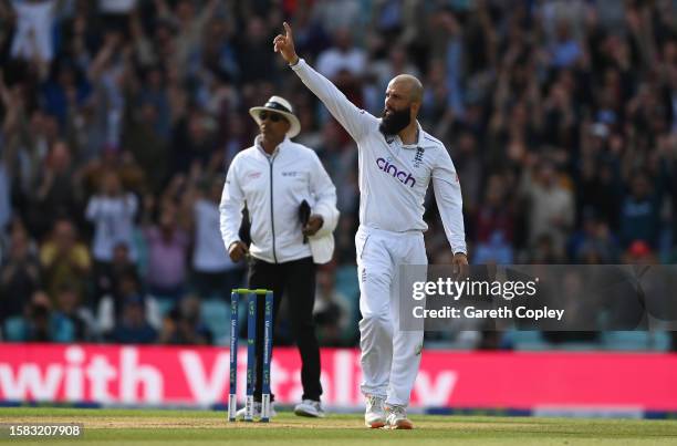 Moeen Ali of England celebrates the wicket of Pat Cummins of Australia during Day Five of the LV= Insurance Ashes 5th Test Match between England and...
