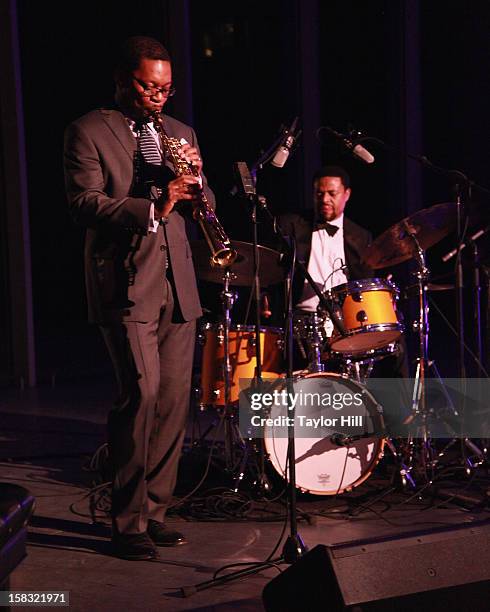 Ravi Coltrane and E.J. Strickland perform at The Museum of Modern Art's Jazz Interlude Gala After Party at MOMA on December 12, 2012 in New York City.