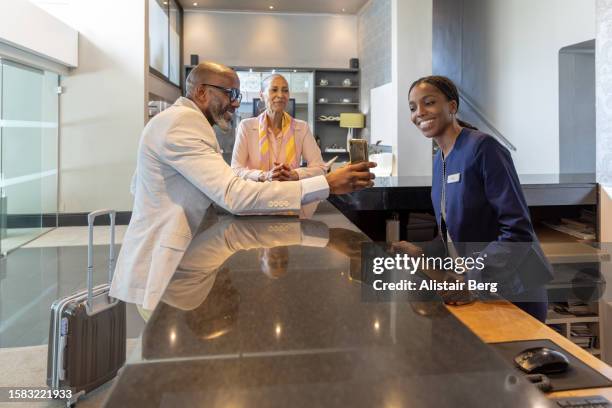 Guest Checking In 49 Hotel Front Desk Old Stock Photos, High-Res Pictures, and Images ...