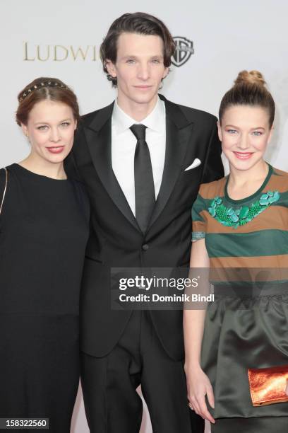 Paula Beer, Hannah Herzsprung and Sabin Tambrea attend Ludwig II - Germany Photocall at HVB Forum on December 13, 2012 in Munich, Germany.