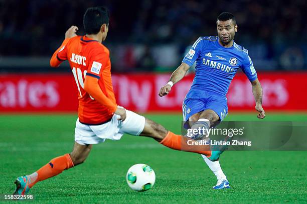 Ashley Cole of Chelsea challenges Jesus Corona of CF Monterrey during the FIFA Club World Cup Semi Final match between CF Monterrey and Chelsea at...