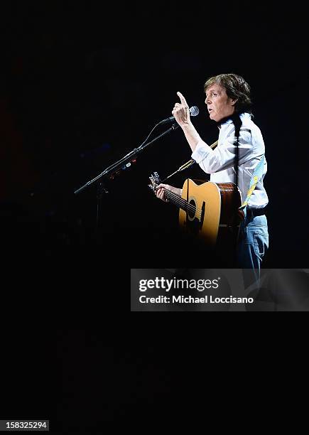 Sir Paul McCartney performs during the "12-12-12" concert benefiting The Robin Hood Relief Fund to aid the victims of Hurricane Sandy presented by...