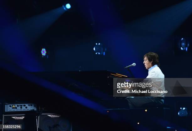 Sir Paul McCartney performs during the "12-12-12" concert benefiting The Robin Hood Relief Fund to aid the victims of Hurricane Sandy presented by...