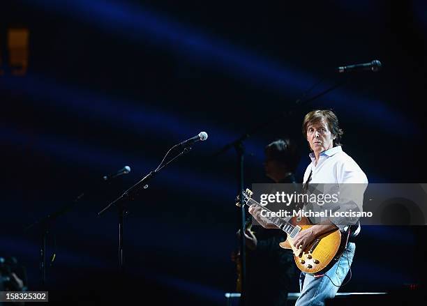 Sir Paul McCartney performs during the "12-12-12" concert benefiting The Robin Hood Relief Fund to aid the victims of Hurricane Sandy presented by...