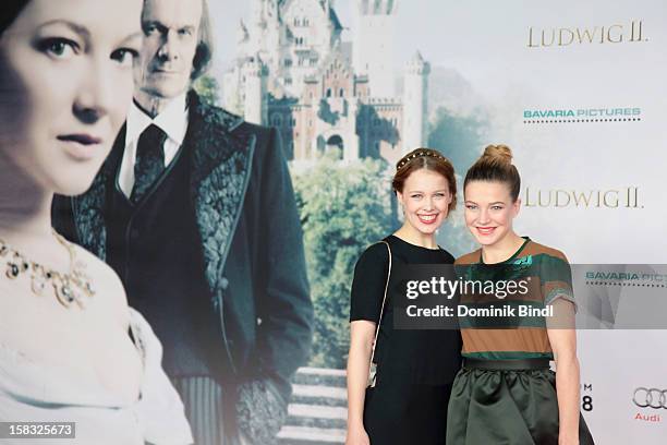 Paula Beer and Hannah Herzsprung attend Ludwig II - Germany Photocall at HVB Forum on December 13, 2012 in Munich, Germany.