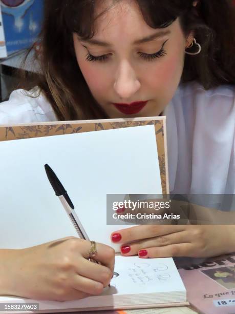 Writer Sara Buho signing at the Madrid's Book Fair at Retiro Park 3 June 2023 in Madrid, Spain.