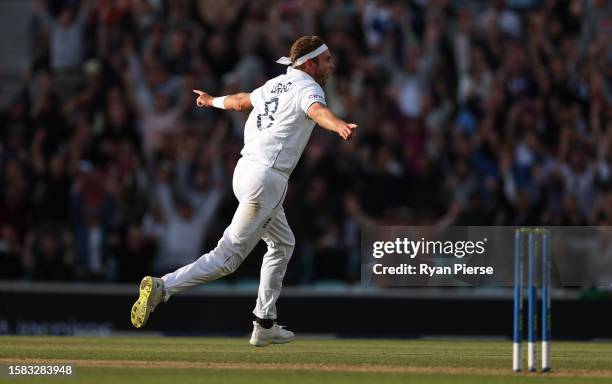 Stuart Broad of England celebrates the wicket of Alex Carey of Australia for the final wicket taken in their final match of their career during Day...