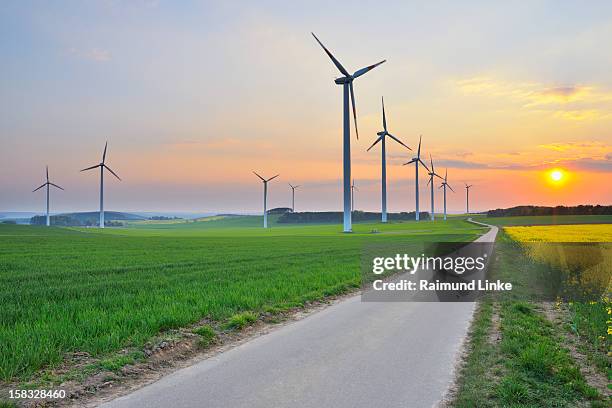 wind turbines with road - baden wurttemberg stock pictures, royalty-free photos & images