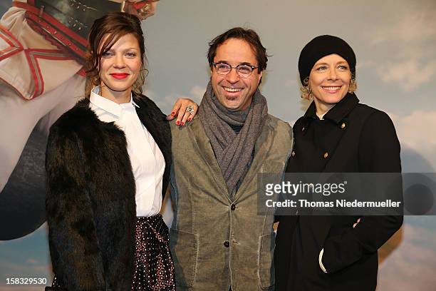 Actress Jessica Schwarz, actor Jan Josef Liefers and actress Katja Riemann attend the red carpet prior to the premiere of 'Baron Muenchhausen' on...