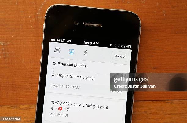 The Google Maps app is seen giving directions on publilc transportation on an Apple iPhone 4S on December 13, 2012 in Fairfax, California. Three...