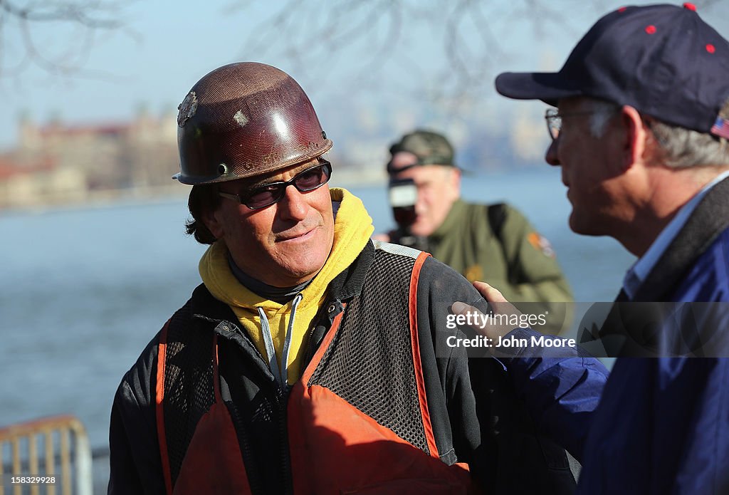 Salazar Views Hurricane Sandy Damage On Tour Of Liberty Island