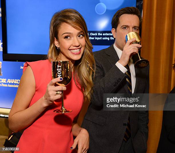 Actors Jessica Alba and Ed Helms toast the 70th Annual Golden Globe Nominations with Moet & Chandon at the The Beverly Hilton on December 13, 2012 in...