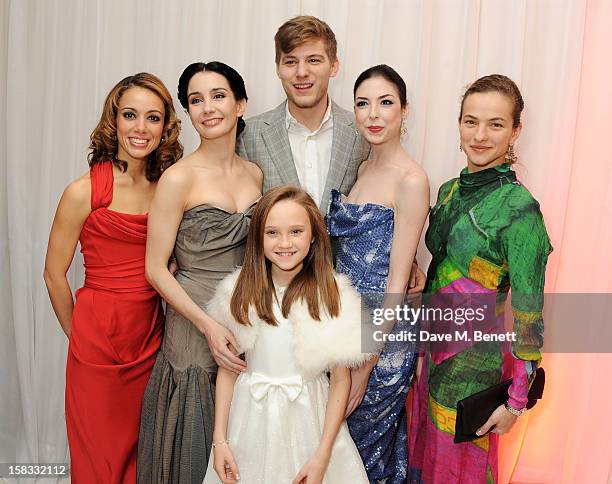 Isabelle Allen poses with dancers from the English National Ballet at the English National Ballet Christmas Party at St Martins Lane Hotel on...