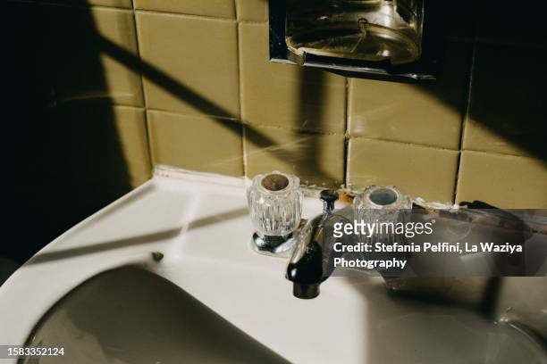 bathroom faucet - water leak stock pictures, royalty-free photos & images