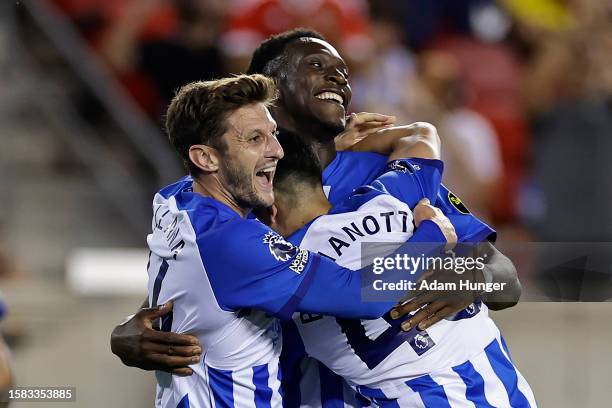 Danny Welbeck of Brighton & Hove Albion celebrate scoring a goal during the Premier League Summer Series match between Brighton & Hove Albion and...