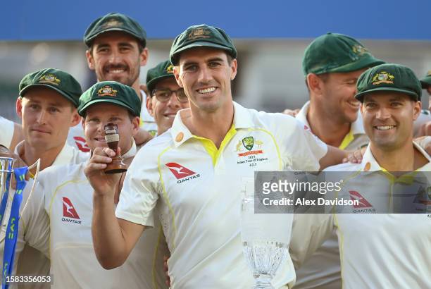 Pat Cummins of Australia lifts the Ashes Urn after retaining the Ashes after Day Five of the LV= Insurance Ashes 5th Test Match. Between England and...