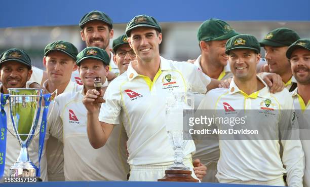 Pat Cummins of Australia lifts the Ashes Urn after retaining the Ashes after Day Five of the LV= Insurance Ashes 5th Test Match. Between England and...