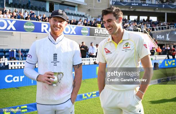 Ben Stokes of England and Pat Cummins of Australia interact following Day Five of the LV= Insurance Ashes 5th Test Match between England and...