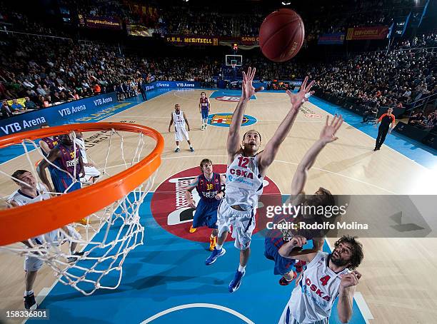 Nenad Krstic, #12 of CSKA Moscow competes with Xavier Rabaseda, #22 of FC Barcelona Regal during the 2012-2013 Turkish Airlines Euroleague Regular...