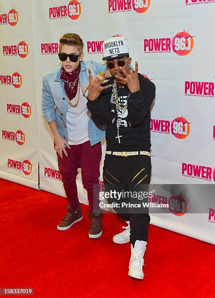 Justin Bieber and Lil Twist attend Power 96.1's Jingle Ball 2012 at Phillips Arena on December 12, 2012 in Atlanta, Georgia.