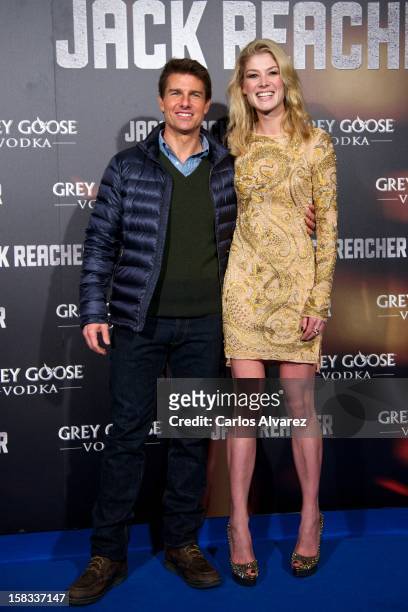 Actor Tom Cruise and actress Rosamund Pike attend the "Jack Reacher" premiere at the Callao cinema on December 13, 2012 in Madrid, Spain.