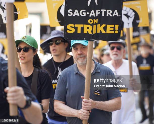 Paul Giamatti joins SAG-AFTRA members as they maintain picket lines across New York City during strike on July 31, 2023 in New York City.