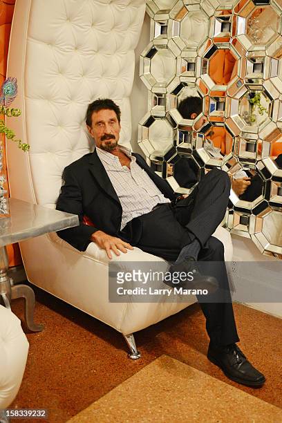 John McAfee poses for a portrait at his hotel in South Beach on December 13, 2012 in Miami Beach, Florida.