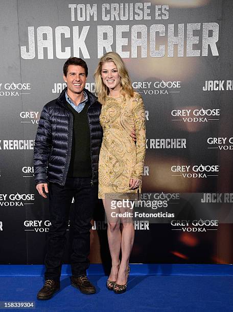 Tom Cruise and Rosamund Pike attend the premiere of 'Jack Reacher' at Callao Cinema on December 13, 2012 in Madrid, Spain.