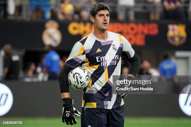 Thibaut Courtois of Real Madrid stands on the field before the pre-season friendly match against FC Barcelona at AT&T Stadium on July 29, 2023 in...